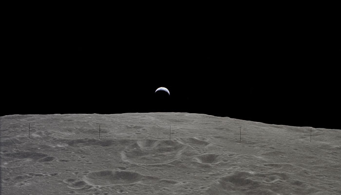 Earth rise as seen from the Moon during the Apollo 12 mission.