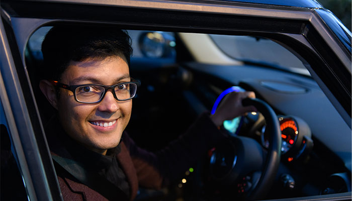 Associate Professor Mauricio Marrone in a car