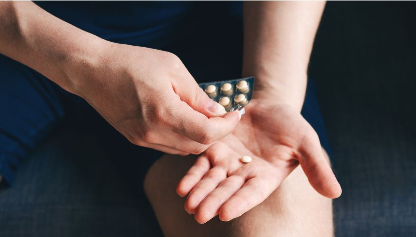 Male taking medication