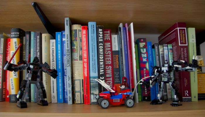 Star Wars figurines sitting on shelf