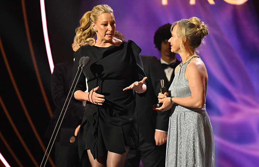 Leigh Sales accepts the Logie for The Assembly. 