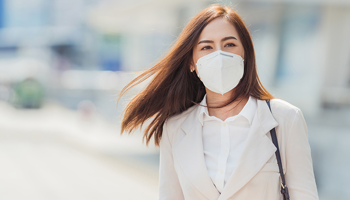 Woman wearing a PM2 face mask