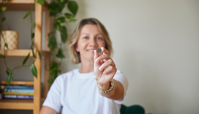 Image of the researcher holding the chip