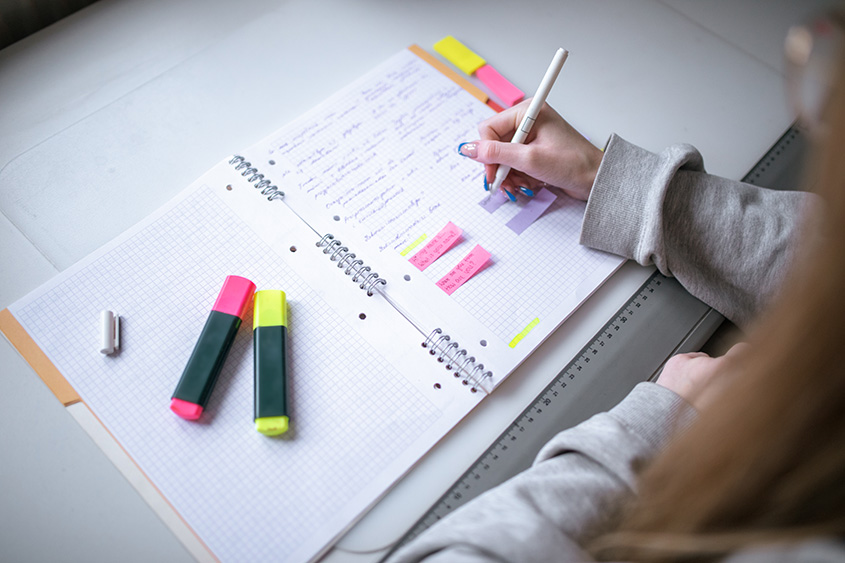 A student studies for exams. 