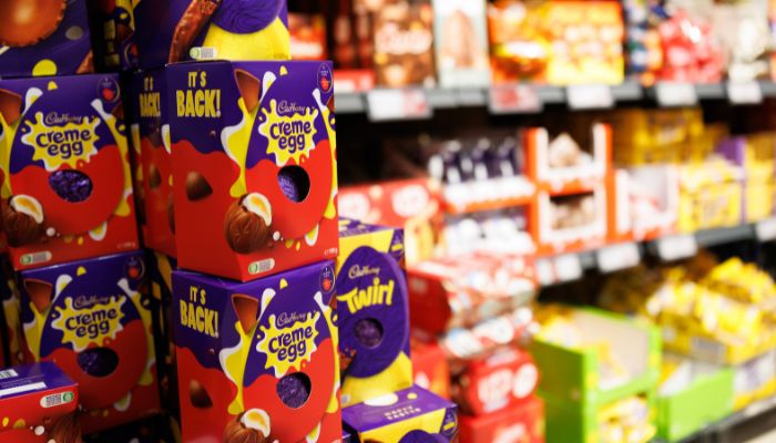 Cadbury's creme Easter Eggs are displayed on a shelf