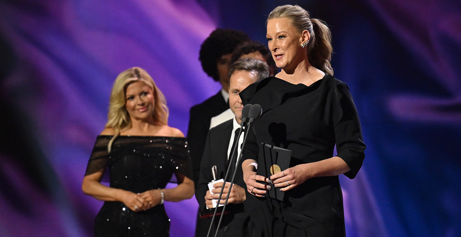Leigh Sales accepts the Logie for The Assembly. 