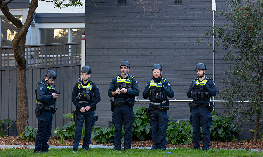MELBOURNE, AUSTRALIA - AUGUST 03: Police watch over the anti-racism protest outside a One Nation event on August 03, 2026 in Melbourne, Australia.